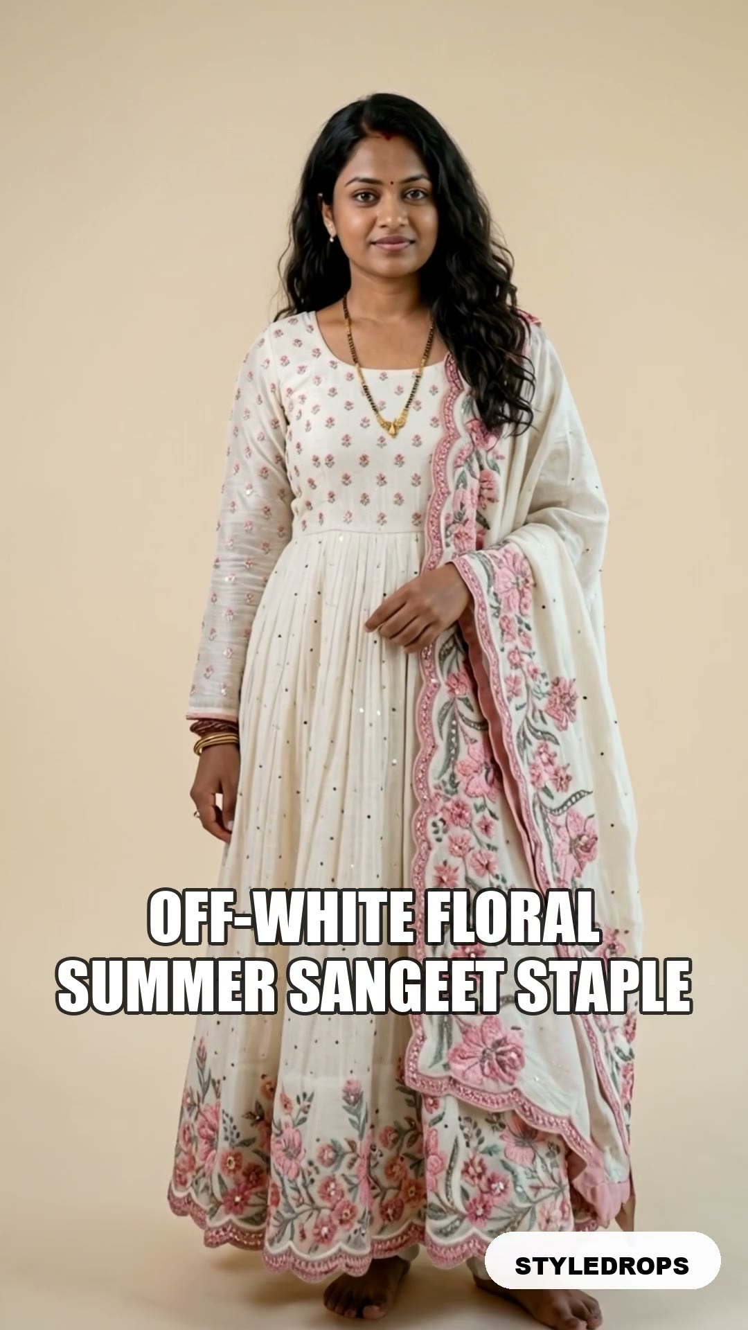 Off-white floral anarkali — sangeet-guest staple that photographs beautifully